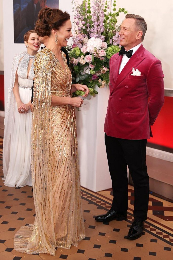 Kate, 39, looked every bit the movie star while wearing a stunning gold beaded Jenny Packham gown with a dramatic cape