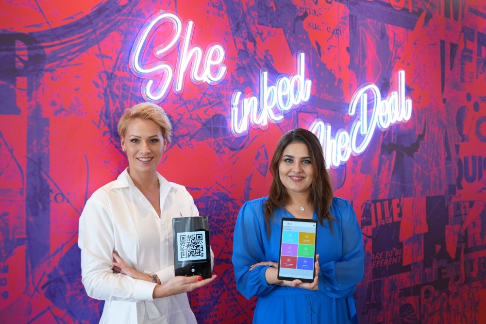 ‘Inking the deal’ (L-R), Judit Toth, General Manager of the INK Hotel and Javeria Aijaz, Managing Director of HITEK.